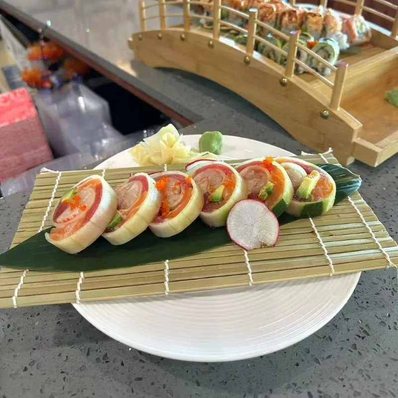 Special sushi roll with ingredients like salmon, avocado, and fish roe.